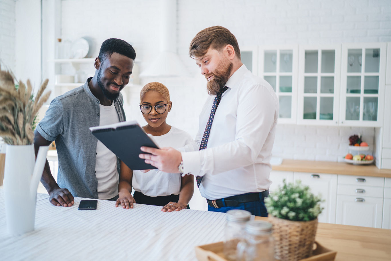 Couple Talking with Apartment Staff Member | Blog | Greystar